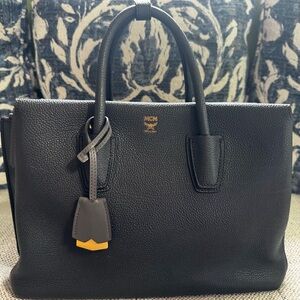 MCM Black Leather Satchel with Gold Accents